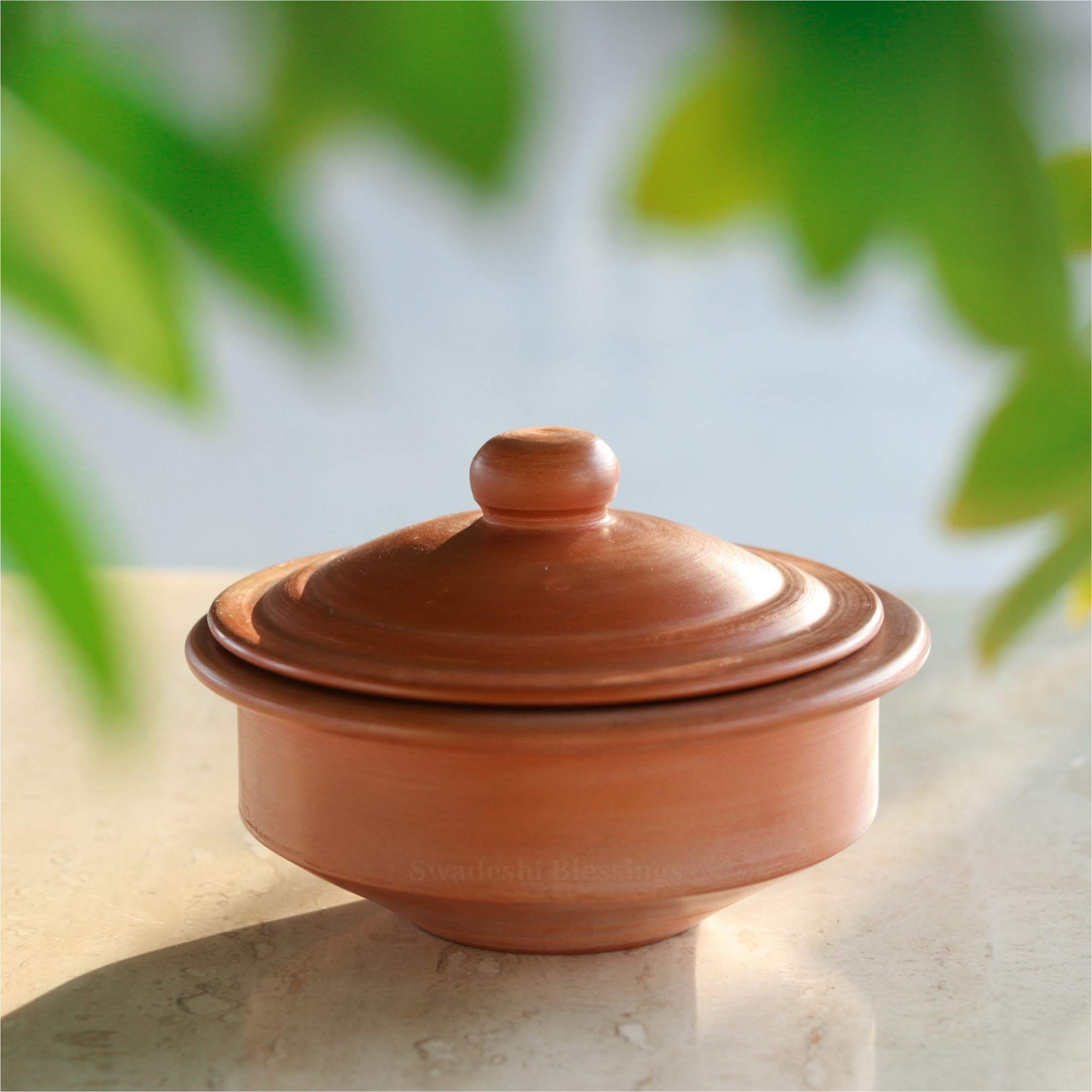 Premium Unglazed Clay Pot for Cooking | Earthen Kadhai | Terracota Regular Dahi Handi | Clay Handi for Serving with Lid, 1.3L | Includes Free Palm Leaf Stand and Ash for Cleaning Swadeshi Blessings